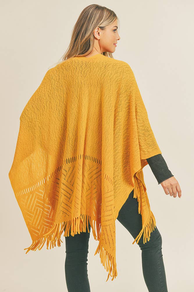 Tricot à chevrons et franges Ruana