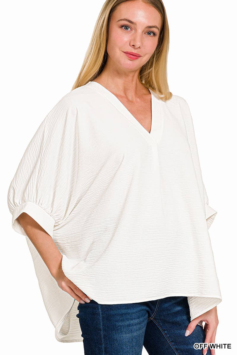 Woven Airflow V Neck Top