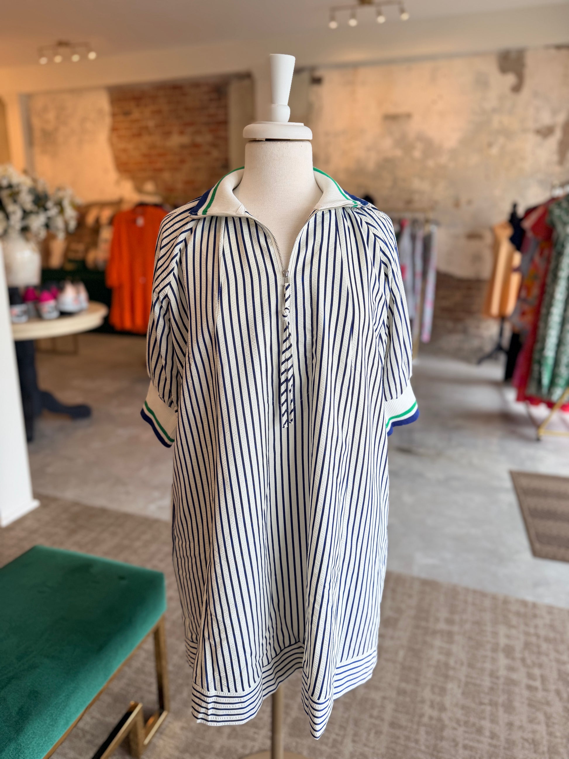 Striped shirt on a mannequin in a store setting