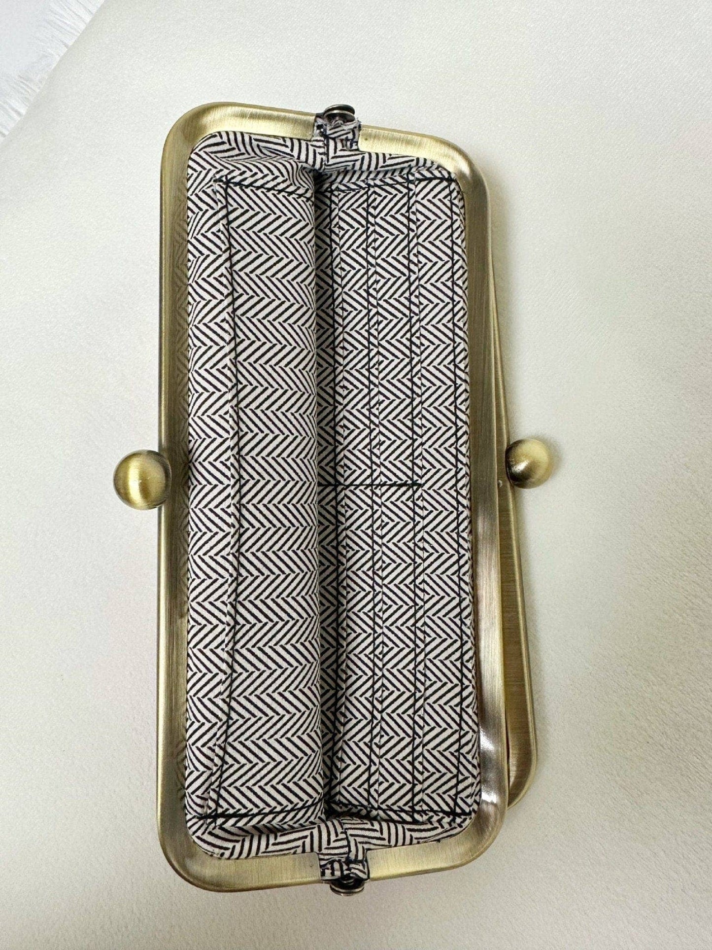Lois Kiss Lock Clutch